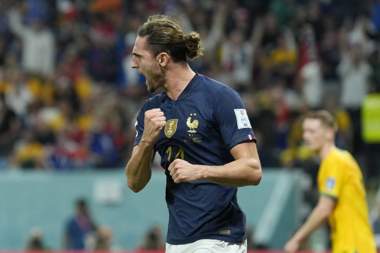 France's Adrien Rabiot celebrates after scoring his side's opening goal during the World Cup group ...