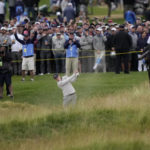 
              FILE - Matthew Fitzpatrick, of England, hits on the 18th hole during the final round of the U.S. Open golf tournament at The Country Club, Sunday, June 19, 2022, in Brookline, Mass. His 9-iron from the bunker on this hole set up the par he needed for a one-shot victory. (AP Photo/Robert F. Bukaty, File)
            