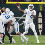 
              Air Force quarterback Haaziq Daniels (4) throws a pass during an NCAA college football game against Army in Arlington, Texas, Saturday, Nov. 5, 2022. (AP Photo/Emil Lippe)
            