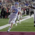 
              Duke quarterback Riley Leonard (13) runs into the end zone to score during the first half of an NCAA college football game against Boston College, Friday, Nov. 4, 2022 in Boston. (AP Photo/Mark Stockwell)
            