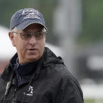 
              FILE - Trainer Todd Pletcher watches horses workout at Churchill Downs, May 3, 2022, in Louisville, Ky. Taiba is the 8-1 choice in the Breeders' Cup Classic horse race Saturday, Nov. 5, 2022, for embattled Hall of Fame trainer Bob Baffert, who makes his Kentucky return after serving a suspension this spring. Steve Asmussen hopes Epicenter provides his third Classic win, while Pletcher looks for his second with Life Is Good. (AP Photo/Charlie Riedel, File)
            