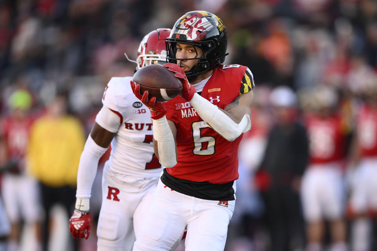 Maryland wide receiver Jeshaun Jones (6) makes a catch en route to scoring a touchdown during the s...