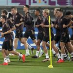 
              German players warm up during a training session at the Al-Shamal stadium on the eve of the group E World Cup soccer match between Germany and Spain, in Al-Ruwais, Qatar, Friday, Nov. 25, 2022. Germany will play the second match against Spain on Sunday, Nov. 27. (AP Photo/Matthias Schrader)
            