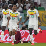 
              Senegal's Famara Diedhiou celebrates after scoring his side's second goal during the World Cup group A soccer match between Qatar and Senegal, at the Al Thumama Stadium in Doha, Qatar, Friday, Nov. 25, 2022. (AP Photo/Thanassis Stavrakis)
            