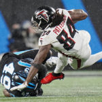 
              Atlanta Falcons running back Cordarrelle Patterson is tackled by Carolina Panthers linebacker Frankie Luvu during the second half of an NFL football game on Thursday, Nov. 10, 2022, in Charlotte, N.C. (AP Photo/Rusty Jones)
            