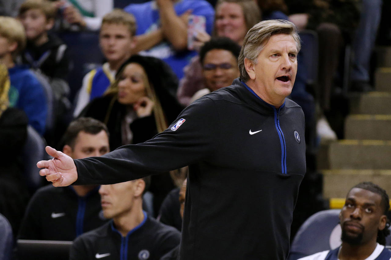 Minnesota Timberwolves coach Chris Finch gestures during the fourth quarter of the team's NBA baske...