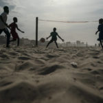 
              Boys play soccer at a beach in Dakar, Senegal, Monday, Nov. 14, 2022. (AP Photo/Leo Correa)
            