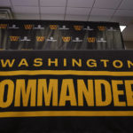 
              The Washington Commanders football team's name and logo is seen at the NFL football team's facility in Ashburn, Va., Thursday, Nov. 10, 2022. The attorney general for the District of Columbia said Thursday his office is filing a civil consumer protection lawsuit against the Washington Commanders, owner Dan Snyder, the NFL and Commissioner Roger Goodell. (AP Photo/Manuel Balce Ceneta)
            