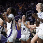 
              Kansas State players celebrate after a basket during the second half of an NCAA college basketball game against Iowa Thursday, Nov. 17, 2022, in Manhattan, Kan. Kansas State won 84-83. (AP Photo/Charlie Riedel)
            