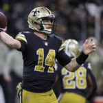 
              New Orleans Saints quarterback Andy Dalton passes against the Los Angeles Rams in the first half of an NFL football game in New Orleans, Sunday, Nov. 20, 2022. (AP Photo/Butch Dill)
            