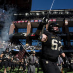 
              Army offensive lineman Sam Barczak (62) runs onto the field with his teammates before an NCAA college football game against Air Force in Arlington, Texas, Saturday, Nov. 5, 2022. (AP Photo/Emil Lippe)
            