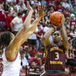 
              Bethune-Cookman guard Marcus Garrett (3) shoots during the first half of an NCAA college basketball game against Indiana, Thursday, Nov. 10, 2022, in Bloomington, Ind. (AP Photo/Doug McSchooler)
            
