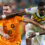 
              Vincent Janssen of the Netherlands, left, fights for the ball with Senegal's Pape Abou Cisse during the World Cup, group A soccer match between Senegal and Netherlands at the Al Thumama Stadium in Doha, Qatar, Monday, Nov. 21, 2022. (AP Photo/Luca Bruno)
            