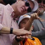 
              Former Tennessee quarterback Payton Manning and his son Marshal watch an NCAA college football game between Georgia and Tennessee, Saturday, Nov. 5, 2022 in Athens, Ga. (AP Photo/John Bazemore)
            