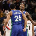 
              Dallas Mavericks guard Spencer Dinwiddie (26) celebrates after forward Dorian Finney-Smith, right, made a 3-point shot against the Portland Trail Blazers during the second half of an NBA basketball game in Dallas, Saturday, Nov. 12, 2022. (AP Photo/Michael Ainsworth)
            