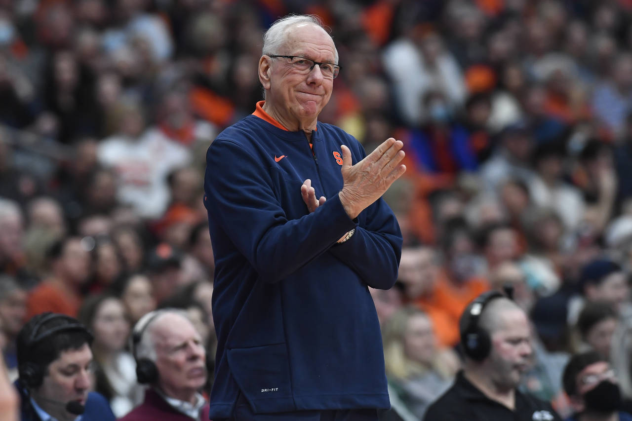 FILE - Syracuse head coach Jim Boeheim gestures during the second half of an NCAA college basketbal...