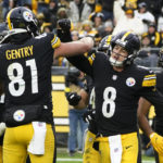 
              Pittsburgh Steelers quarterback Kenny Pickett (8) celebrates after scoring on a one-yard quarterback sneak during the second half of an NFL football game against the New Orleans Saints in Pittsburgh, Sunday, Nov. 13, 2022. (AP Photo/Keith Srakocic)
            