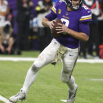 
              Minnesota Vikings quarterback Kirk Cousins (8) looks to pass during the first half of an NFL football game against the Dallas Cowboys, Sunday, Nov. 20, 2022, in Minneapolis. (AP Photo/Bruce Kluckhohn)
            