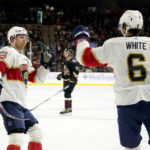 
              Florida Panthers center Colin White (6) celebrates his goal against the Arizona Coyotes with center Sam Bennett, left, during the second period of an NHL hockey game in Tempe, Ariz., Tuesday, Nov. 1, 2022. (AP Photo/Ross D. Franklin)
            