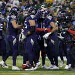 
              Tennessee Titans tight end Austin Hooper. center right, celebrates with teammates after catching a touchdown pass thrown by running back Derrick Henry during the second half of an NFL football game against the Green Bay Packers Thursday, Nov. 17, 2022, in Green Bay, Wis. (AP Photo/Matt Ludtke)
            