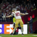 
              San Francisco 49ers tight end George Kittle celebrates after scoring a touchdown during the second half of an NFL football game against the Arizona Cardinals, Monday, Nov. 21, 2022, in Mexico City. (AP Photo/Marcio Jose Sanchez)
            