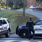 
              Charlottesville police secure a crime scene of an overnight shooting at the University of Virginia, Monday, Nov. 14, 2022, in Charlottesville. Va. (AP Photo/Steve Helber)
            