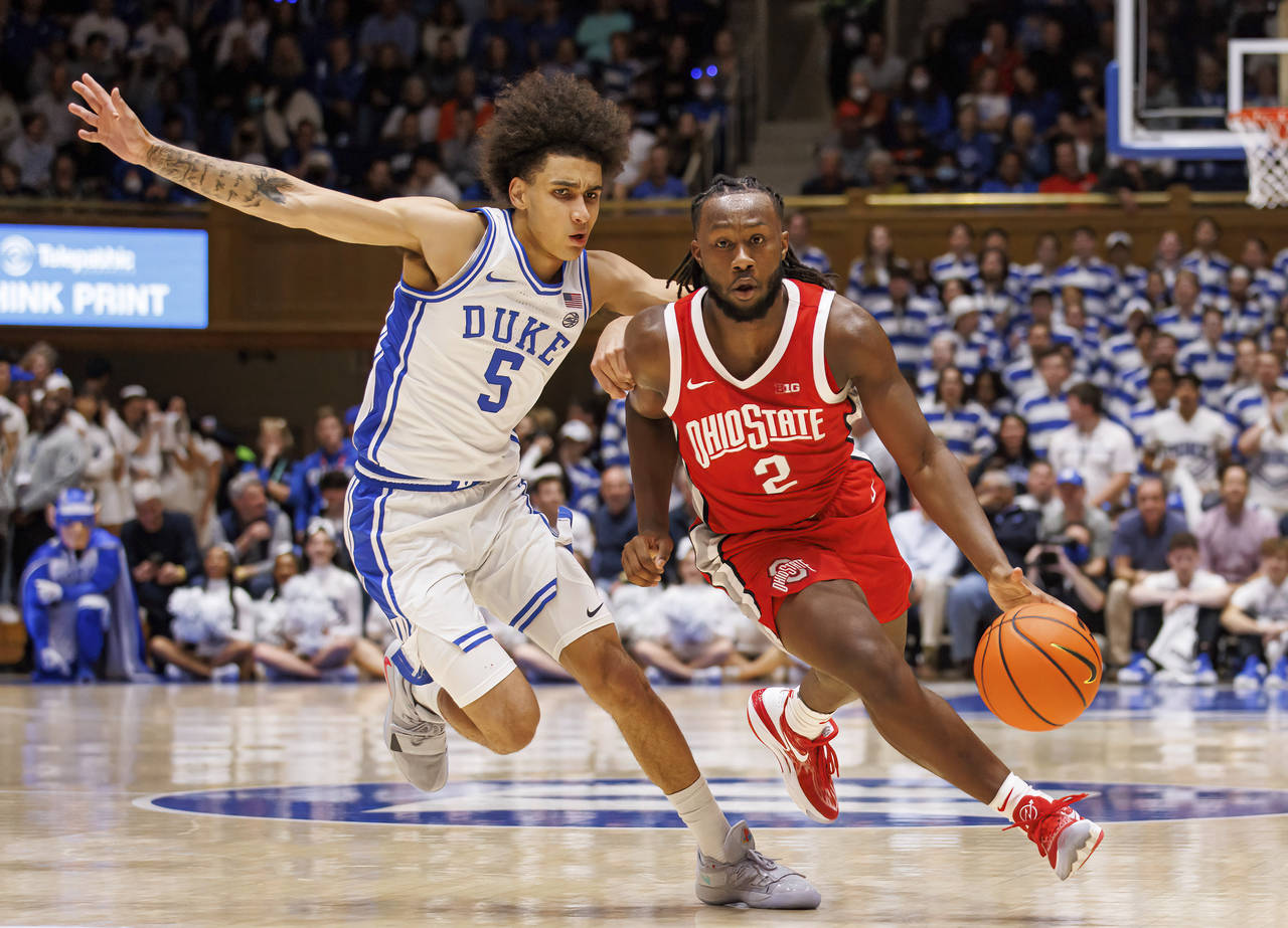 Ohio State's Bruce Thornton (2) handles the ball as Duke's Tyrese Proctor (5) defends during the fi...