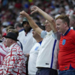 
              England supporters on the stands during the World Cup group B soccer match between England and The United States, at the Al Bayt Stadium in Al Khor , Qatar, Friday, Nov. 25, 2022. (AP Photo/Ashley Landis)
            