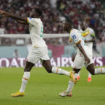 
              Senegal's Boulaye Dia celebrates scoring his side's first goal during the World Cup group A soccer match between Qatar and Senegal, at the Al Thumama Stadium in Doha, Qatar, Friday, Nov. 25, 2022. (AP Photo/Thanassis Stavrakis)
            