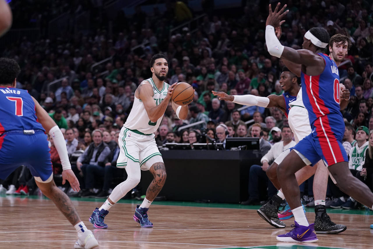 Boston Celtics forward Jayson Tatum (0) takes a shot against the Detroit Pistons during first half ...