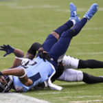 
              Tennessee Titans wide receiver Robert Woods (2) makes the catch ahead of Cincinnati Bengals cornerback Eli Apple (20) during the first half of an NFL football game, Sunday, Nov. 27, 2022, in Nashville, Tenn. (AP Photo/Mark Zaleski)
            