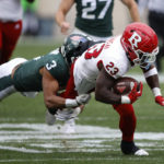 
              Rutgers running back Kyle Monangai, right, is tackled by Michigan State's Xavier Henderson (3) during the first half of an NCAA college football game, Saturday, Nov. 12, 2022, in East Lansing, Mich. (AP Photo/Al Goldis)
            