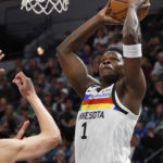 
              Minnesota Timberwolves forward Anthony Edwards (1) goes up to dunk against the Miami Heat in the first quarter of an NBA basketball game Monday, Nov. 21, 2022, in Minneapolis. (AP Photo/Bruce Kluckhohn)
            
