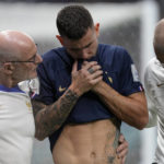 
              France's Lucas Hernandez leaves the pitch after getting injured during the World Cup group D soccer match between France and Australia, at the Al Janoub Stadium in Al Wakrah, Qatar, Tuesday, Nov. 22, 2022. (AP Photo/Thanassis Stavrakis)
            
