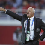 
              FILE - Australia's head coach Graham Arnold, directs his players during the AFC Asian Cup group B soccer match between Australia and Syria at the Khalifa bin Zayed Stadium in Al Ain, United Arab Emirates. Arnold has named his 26-man squad, Tuesday, Nov. 8, 2022, to represent Australia, at the FIFA World Cup Qatar 2022. (AP Photo/Hassan Ammar, File)
            