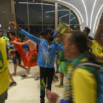 
              A street marshal gives indications to fans at a subway station prior to the World Cup group G soccer match between Brazil and Serbia, at the Lusail Stadium in Lusail, Qatar, Thursday, Nov. 24, 2022. The World Cup 2010 in South Africa had Shakira. The 1998 World Cup in France had Ricky Martin. In Qatar, the tune that nests itself in the head is the incessant chanting of street marshals, better knows as Last Mile Marshals. Seated all over Doha on high chairs more commonly used by lifeguards at swimming pools, these migrant workers have become a staple of the Middle East's first World Cup. (AP Photo/Moises Castillo)
            