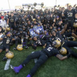 
              James Madison players gather for a group photo as they celebrate after an NCAA college football game against Coastal Carolina in Harrisonburg, Va., Saturday, Nov. 26, 2022. (Daniel Lin/Daily News-Record via AP)
            