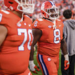 
              Clemson defensive tackle Tre Williams (8) walks off the field after losing to South Carolina 31-30 in an NCAA college football game on Saturday, Nov. 26, 2022, in Clemson, S.C. (AP Photo/Jacob Kupferman)
            