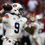 
              Auburn quarterback Robby Ashford looks to throw a pass against Alabama during the first half of an NCAA college football game Saturday, Nov. 26, 2022, in Tuscaloosa, Ala. (AP Photo/Butch Dill)
            