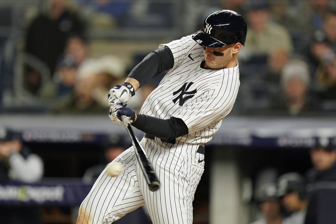 New York Yankees Anthony Rizzo (48) connects for an RBI base hit against the Houston Astros during ...