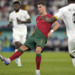 
              Portugal's Cristiano Ronaldo controls the ball during the World Cup group H soccer match between Portugal and Ghana, at the Stadium 974 in Doha, Qatar, Thursday, Nov. 24, 2022. (AP Photo/Ariel Schalit)
            