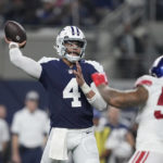 
              Dallas Cowboys quarterback Dak Prescott (4) throws a pass against the New York Giants during the second half of an NFL football game Thursday, Nov. 24, 2022, in Arlington, Texas. (AP Photo/Tony Gutierrez)
            