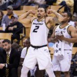 
              Missouri's Tre Gomillion flexes after a teammate's three point basket during the second half of an NCAA college basketball game against Lindenwood, Sunday, Nov. 13, 2022, in Columbia, Mo. Missouri won 82-53. (AP Photo/L.G. Patterson)
            