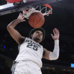 
              Michigan State forward Malik Hall (25) scores against Kentucky during the second half of an NCAA college basketball game, Tuesday, Nov. 15, 2022, in Indianapolis. (AP Photo/Darron Cummings)
            