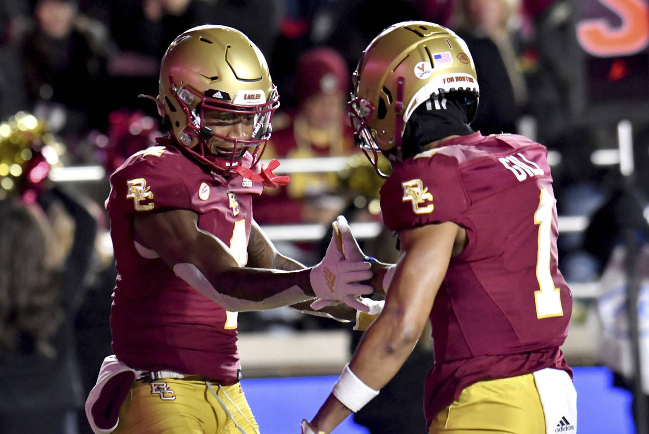 Boston College Zay Flowers (4) and Jaelen Gill (1) celbrate Flowers' touchdown during the first hal...