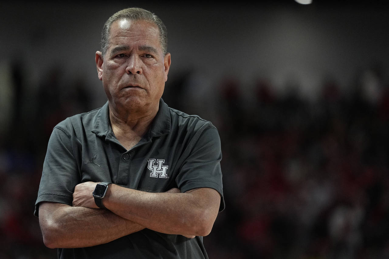 Houston head coach Kelvin Sampson watches during an NCAA college basketball game against Kent State...
