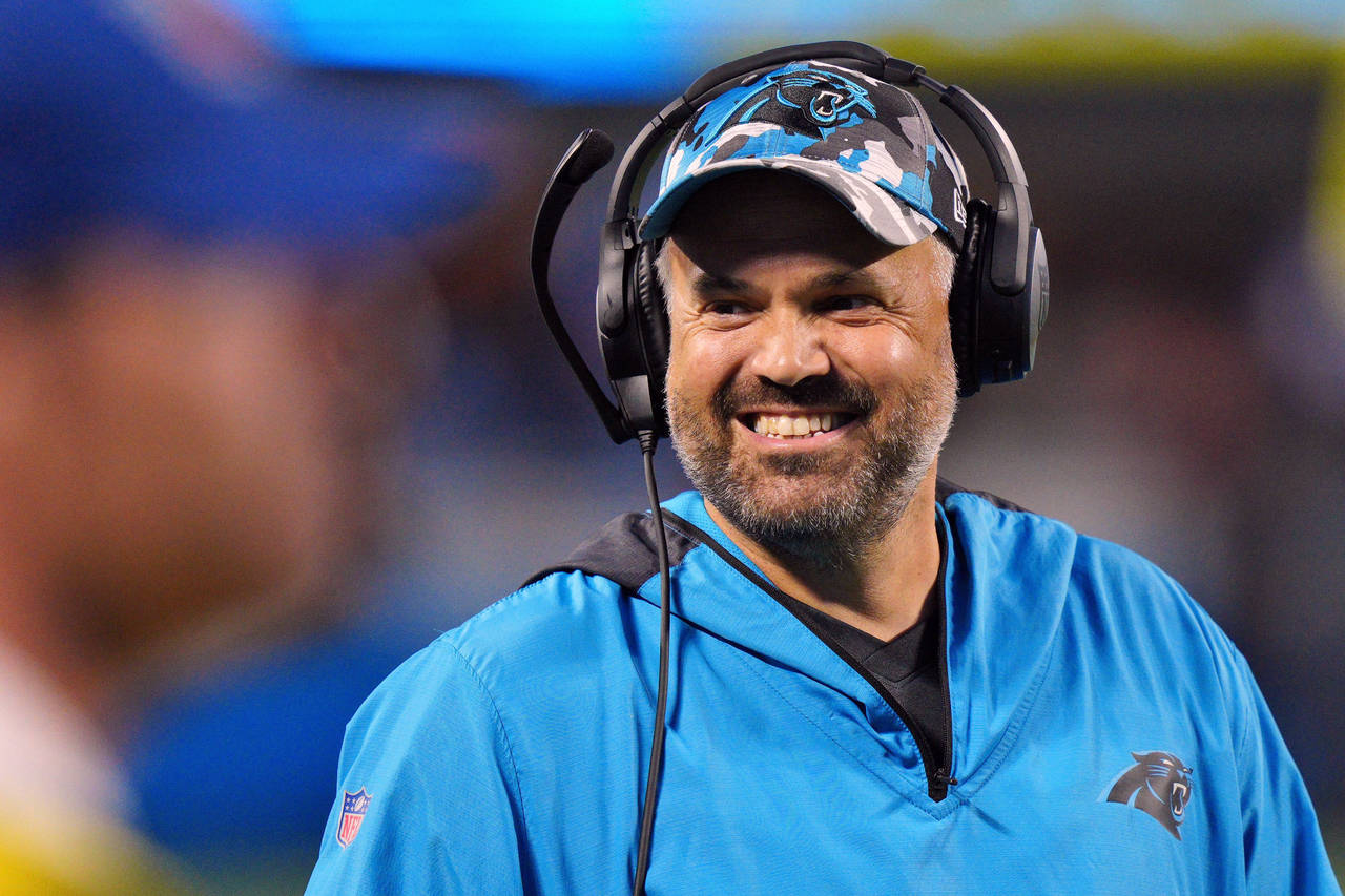 FILE -  Carolina Panthers head coach Matt Rhule smiles during the first half of an NFL preseason fo...