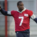 
              Seattle Seahawks quarterback Geno Smith throws a ball during a practice session in Munich, Germany, Thursday, Nov. 10, 2022. The Tampa Bay Buccaneers are set to play the Seattle Seahawks in a NFL game at the Allianz Arena in Munich on Sunday. (AP Photo/Matthias Schrader)
            