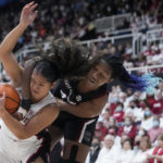
              Stanford guard Talana Lepolo, left, is fouled by South Carolina forward Aliyah Boston, right, during the first half of an NCAA college basketball game in Stanford, Calif., Sunday, Nov. 20, 2022. (AP Photo/Godofredo A. Vásquez)
            