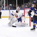 
              New York Islanders goaltender Ilya Sorokin (30) defends the net against St. Louis Blues' Jake Neighbours (63) during the second period of an NHL hockey game Thursday, Nov. 3, 2022, in St. Louis. (AP Photo/Jeff Le)
            